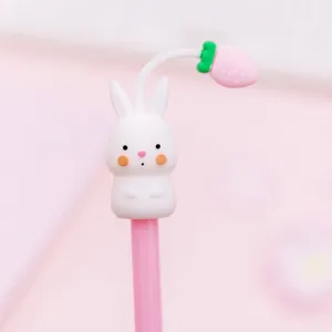 Cute cartoon bunny gel pen detail, pink rabbit topper with sprout, smooth black ink writing.