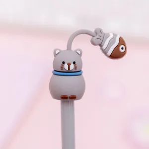 Cute grey cat cartoon gel pen detail with dangling fish charm and soft silicone texture tip.