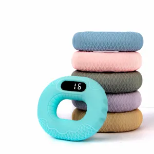 Entraineur de force de préhension en silicone intelligent avec affichage numérique et couleurs.