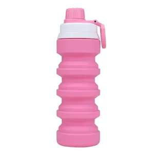 Collapsible silicone water bottle, pink portable travel tumbler for sports and outdoor use.