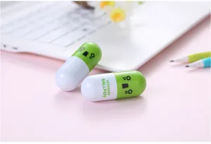 Mini lindo bolígrafo de cápsula con cara sonriente novedad papelería de estudiante regalo.