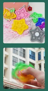 Portachiavi giocattolo antistress pop it in silicone a stella e trottola per relax.