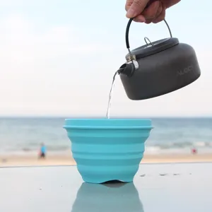 Portable collapsible silicone bowl for outdoor travel and camping, detail scene view.