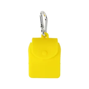 Yellow silicone mini storage pouch with metal carabiner for travel and daily use.