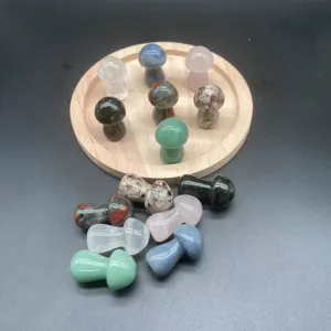 Detail shot of natural crystal stone mushroom carvings showing various gemstone colors.