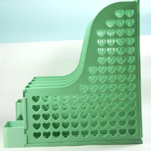 Organizzatore da scrivania in plastica verde con design a cuore per archiviazione ufficio.