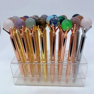 Crystal sphere ballpoint pen with natural gemstone crystal ball, elegant metal barrel and stand.