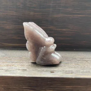 Natural gemstone flower fairy crystal carving detail view, exquisite small crystal ornament.
