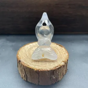Crystal yoga woman figurine detail shot, natural stone meditation statue 5cm clear quartz.