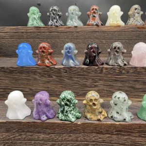 Detailed view of natural crystal ghost figurines, gemstone miniature carvings for Halloween decor.
