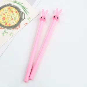 Pink cute rabbit gel pen detail shot, cute bunny ear design, smooth writing stationery item.