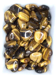 Natural tiger eye crystal heart detail view, 3cm polished gemstone pocket palm healing stone.