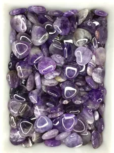 Natural amethyst crystal heart pocket stone, polished healing gemstone for decor and gift.