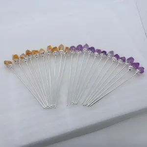 Exquisite crystal hair pin detail featuring natural amethyst and citrine stones with lotus base.
