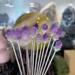 Close-up view of vintage alloy hair pins decorated with natural purple crystal stone.