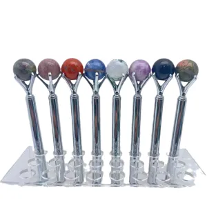Ensemble de stylos à bille en pierre de cristal naturelle avec support de présentation.