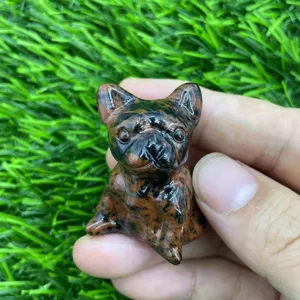 Natural stone crystal French bulldog puppy carving detail view, cute gemstone dog decor.
