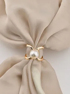 Elegant gold-tone cross scarf ring detail featuring a central white pearl for chic daily styling.