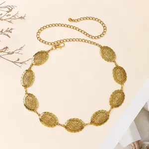 Retro gold metal waist chain with hollow floral medallions, adjustable belt for dress and chic style.