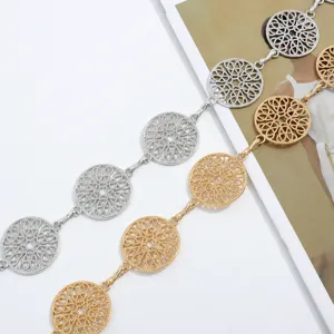 Elegant metal waist chain with hollow round medallions, stylish gold and silver accessories.