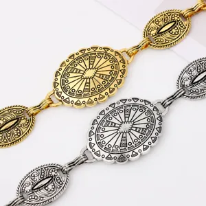 Detail view of fashion retro bohemian waist chain, chic geometric metal body jewelry.