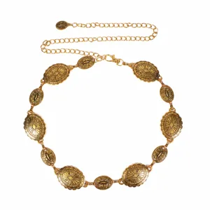 Detailed vintage bohemian metallic waist chain with carved oval plates for trendy outfits.