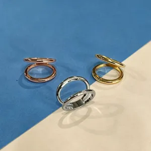 French minimalist scarf buckle set, metal dual ring clip for clothing and styling.