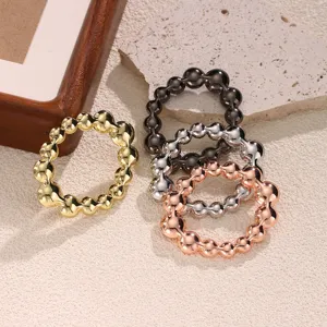 Metal bead scarf ring detail shot showing four assorted colors including gold silver rose gold.