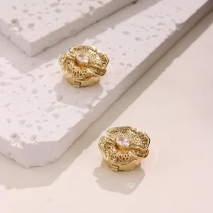 Gold-tone hollow floral button cover with central crystal zircon detail for shirts.