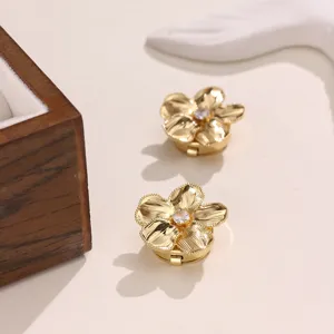 Exquisite flower button cover with sparkling zircon inlay, premium brass shirt cufflinks detail.