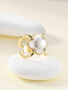 Gold-tone four-leaf clover scarf ring with white pearl insert and sparkling rhinestones.