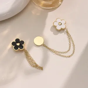 Camellia flower magnetic pants waist tightening pin set, elegant metal chain trousers clip detail.