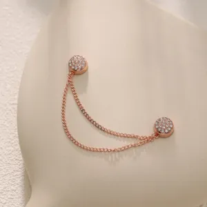 Rose gold rhinestone magnetic chain clip for clothing hem adjustment and stylish accessory.