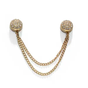 Gold magnetic collar clip with rhinestones and double chains for clothing adjustment.