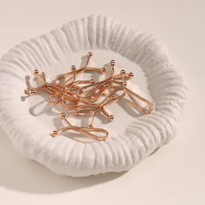 Pratiques clips de fixation multifonctionnels en métal or rose pour écharpes et taille.