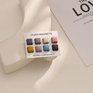 Detail view of square hijab magnets set, multi-color magnetic pins for muslim scarves.