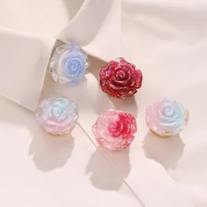 Set of 5 colorful resin camellia flower button covers, stylish DIY apparel accessories.