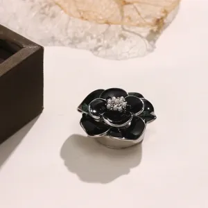 Copertura per bottone fiore di camelia nera perla metallo camicia accessorio decoro