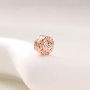 Rose gold magnetic scarf clip with retro carved pattern and sparkling rhinestones for women.