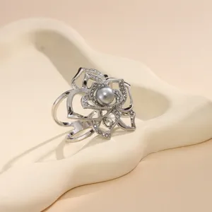 Silver camellia scarf ring with sparkling rhinestones and grey pearl for winter coats.