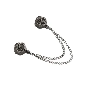 Magnetic clothing clips for shirt hem and pants cuffs, stylish metal rose design.