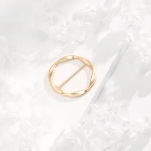 Minimalist golden twist round silk scarf buckle, elegant clothing corner ring for daily wear.