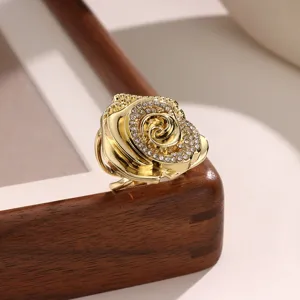 Golden rose flower scarf ring detail, exquisite rhinestone crystal decor for elegant shawls.