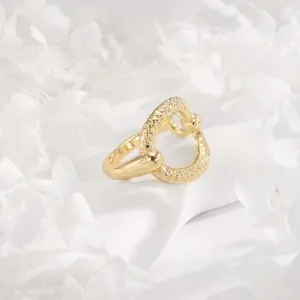 Gold scarf ring buckle for women, stylish multi-functional clothing hem knot clip accessory.
