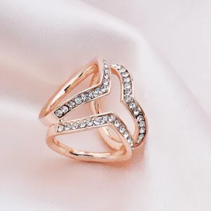 Rose gold alloy crystal pavé three ring scarf buckle detail view showing sparkling rhinestones.