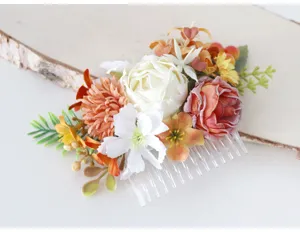 Artificial flower hair comb with vintage autumn roses and leaves for bridal and party updo.