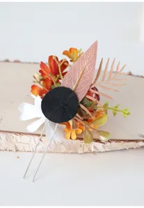 Detailed close-up of autumn pastoral floral hair hairpin, featuring orange and white botanical design.