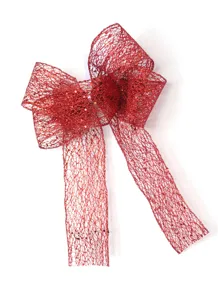 Vista dettagliata di un fiocco in rete glitterata rossa, perfetto per albero o confezione regalo.