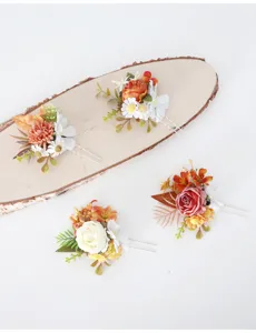 Autumn floral hairpins set with artificial roses and daisies for rustic wedding styling.