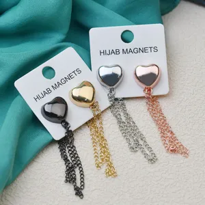Heart-shaped magnetic hijab pins with tassel chains multi-functional scarf clips for daily wear.